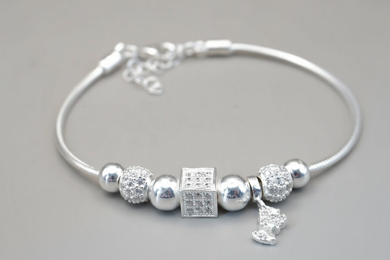 PULSERA CHARMS FLOR PLATA .925