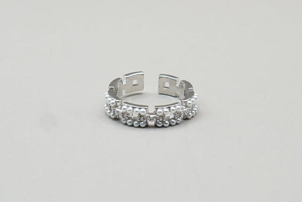 ANILLO ESLABONES C/PERLA AJUSTABLE CHAPA DE RODIO