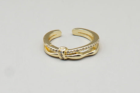 ANILLO CON NUDO ZIRCONIAS CH ORO AJUSTABLE