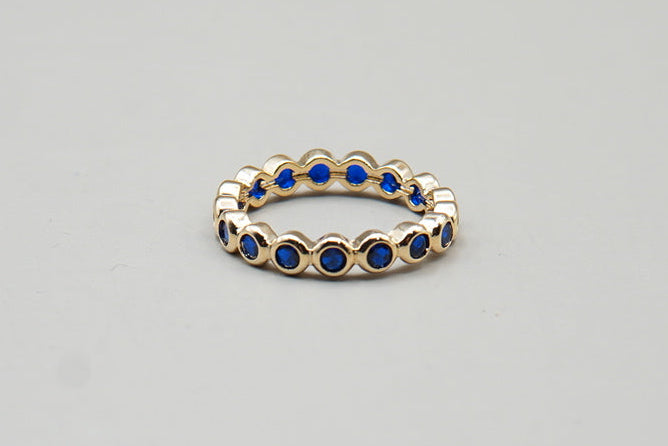 ANILLO C/ZIRCONIAS AZULES  # 7 CHAPA DE ORO