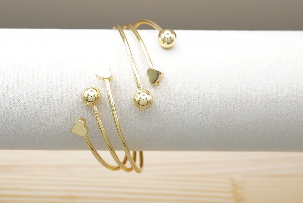 BRAZALETE BOLAS CORAZONES ORO LAMINADO