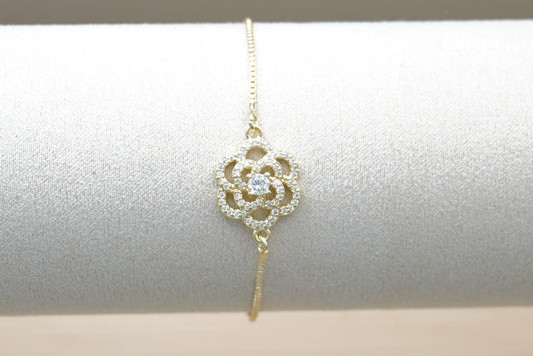 PULSERA AJUSTABLE FLOR ZIRCONIA CHAPA DE ORO