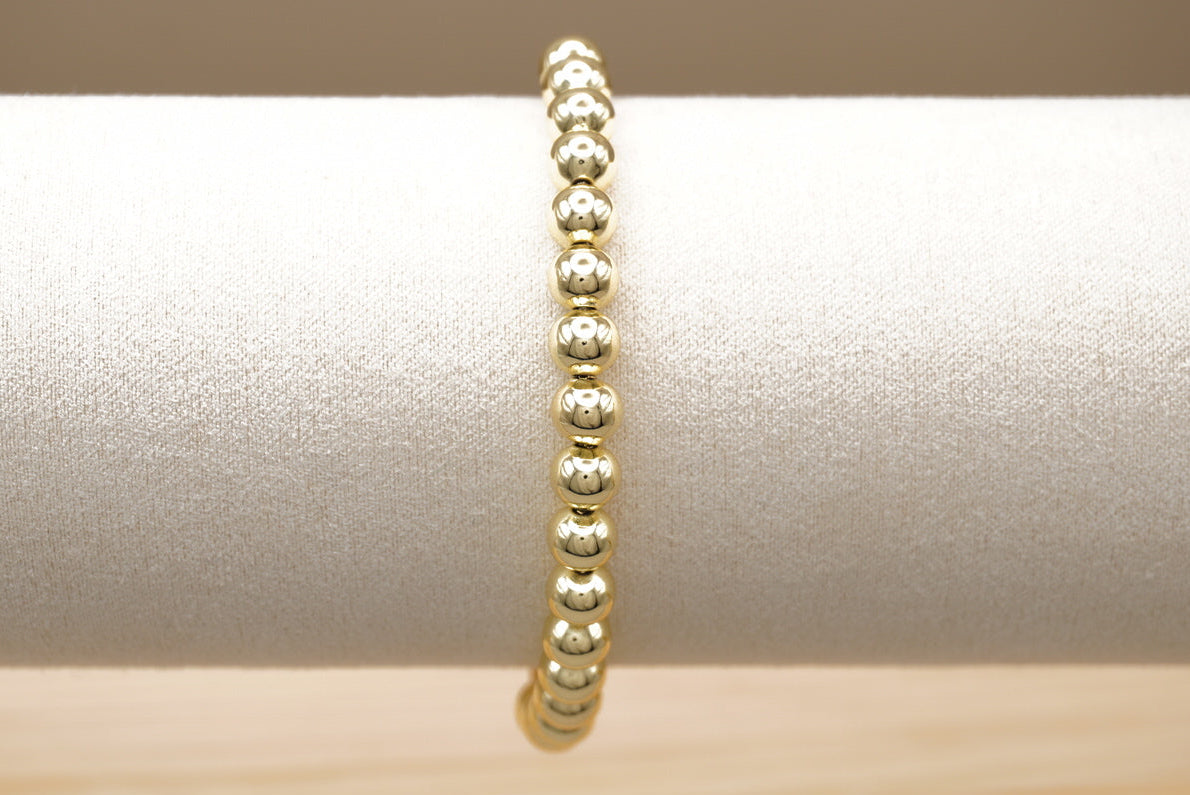 PULSERA BOLITAS AJUSTABLE CHAPA DE ORO