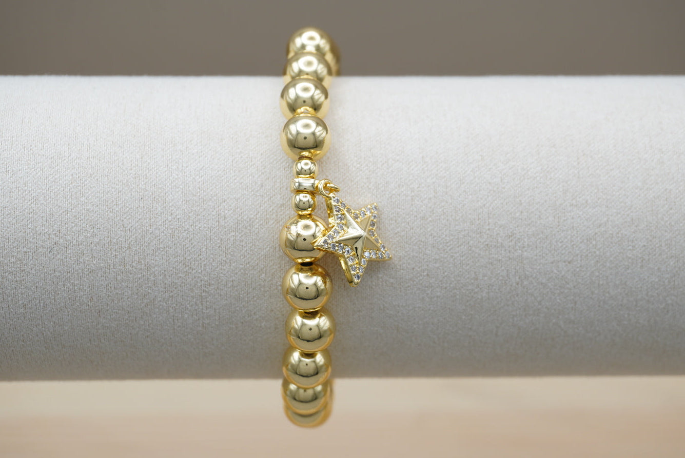 PULSERA BOLITAS DIJE ESTRELLA CHAPA DE ORO
