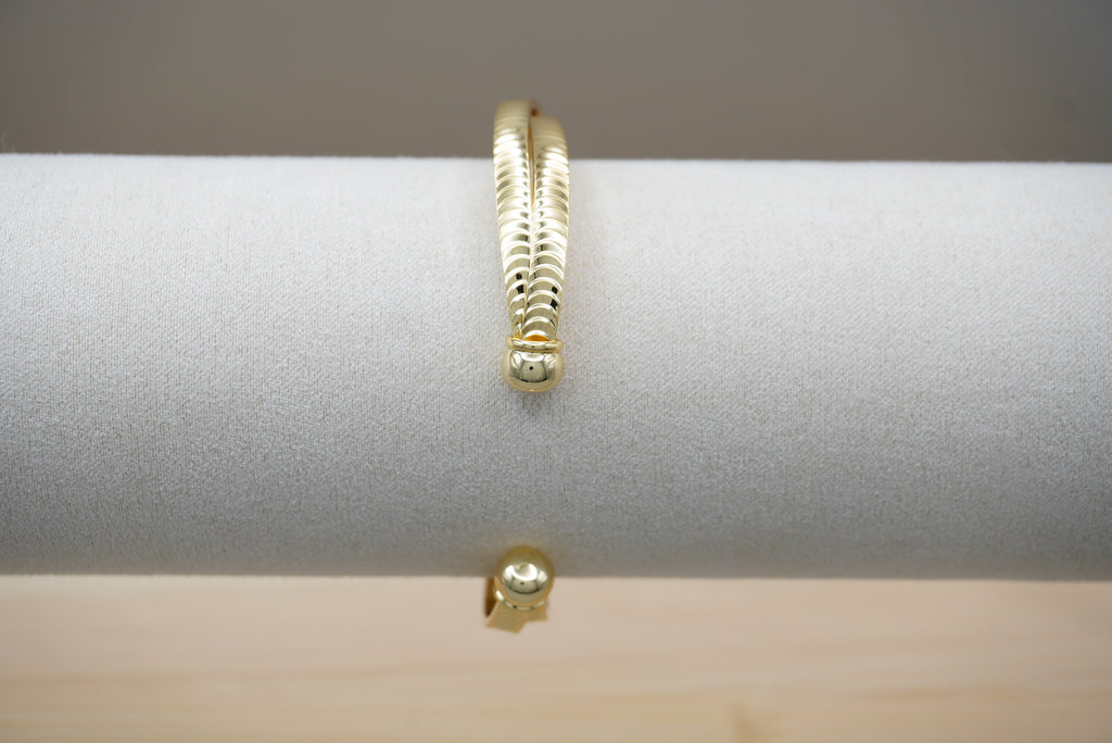 BRAZALETE CRUZADO DIAMANTADO CHAPA DE ORO