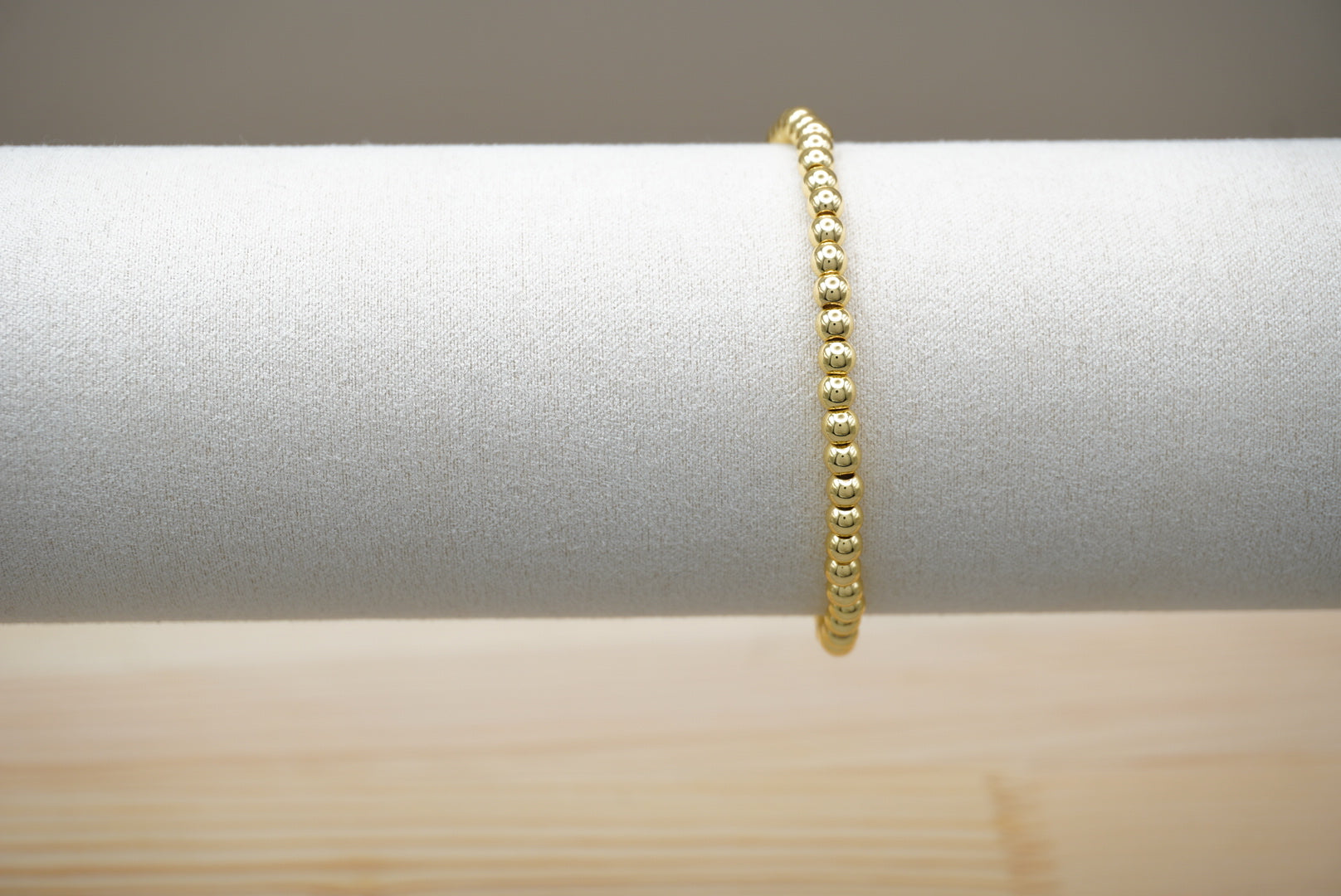 PULSERA BOLITA 4MM DORADO ACERO