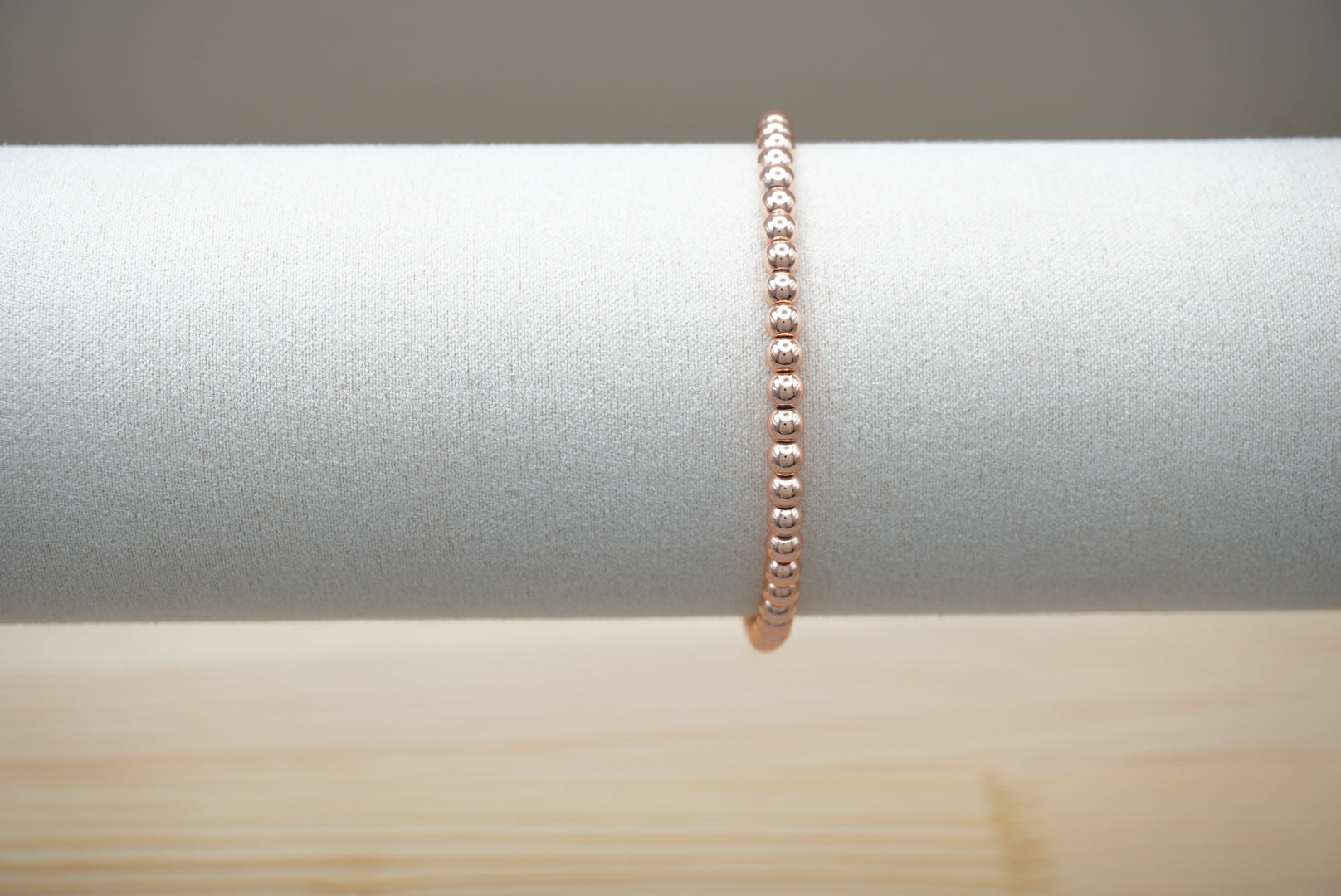 PULSERA BOLITA 4MM ROSA ACERO