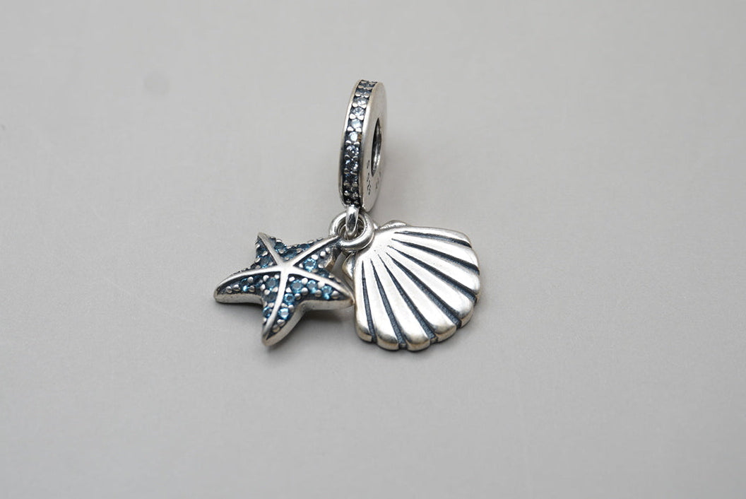 CHARM ESTRELLA Y CONCHA MARINA PLATA .925