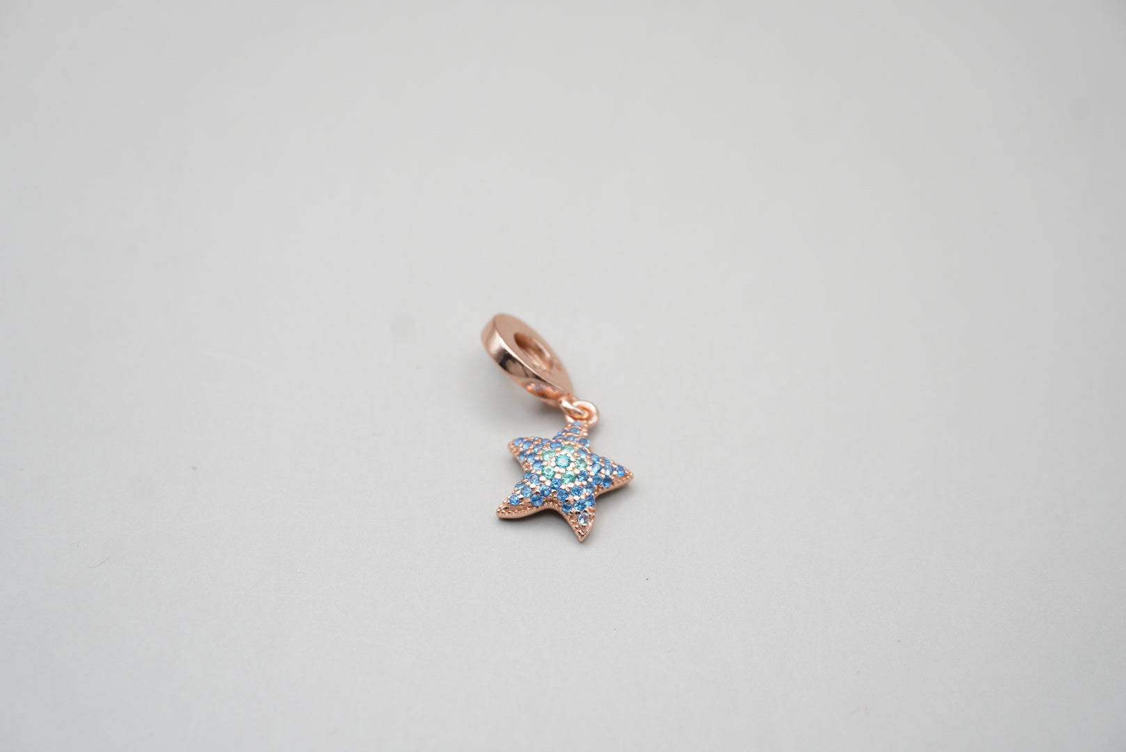 CHARM ESTRELLA DE MAR PLATA .925 CON BAÑO DE ORO ROSA