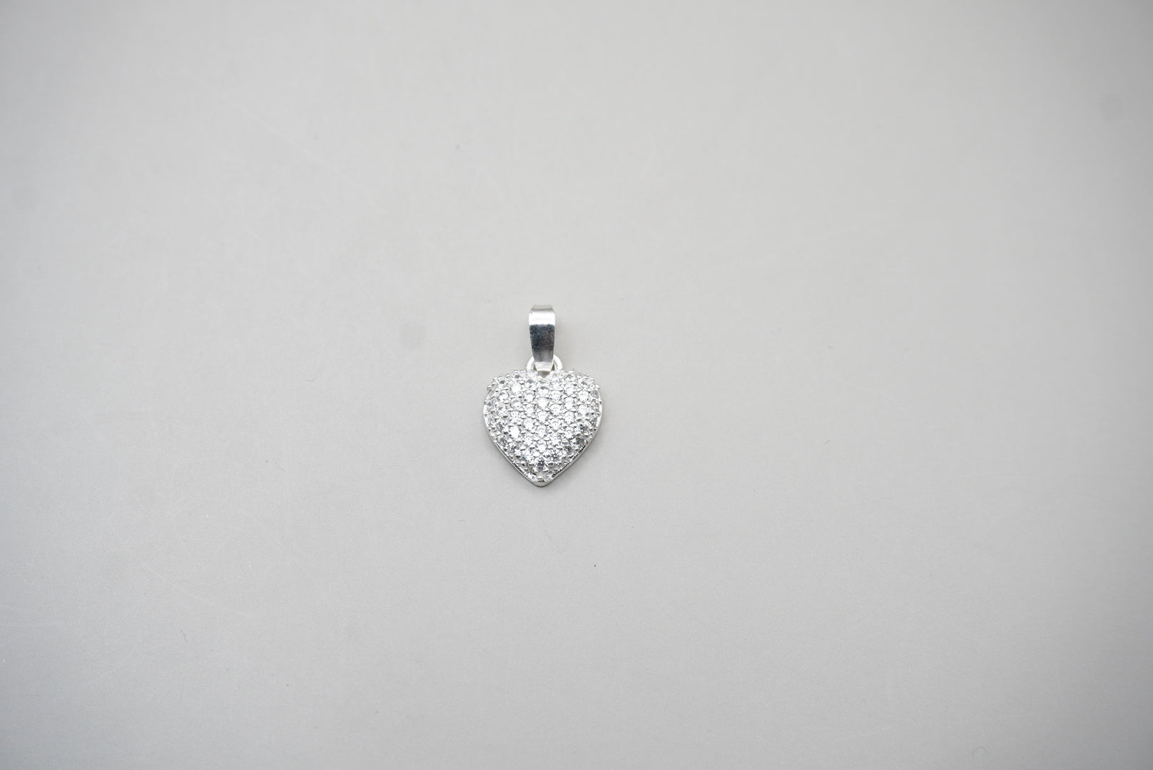 DIJE CORAZON ZIRCONIAS BISELADO TAMAÑO 1.5 CM PLATA .925