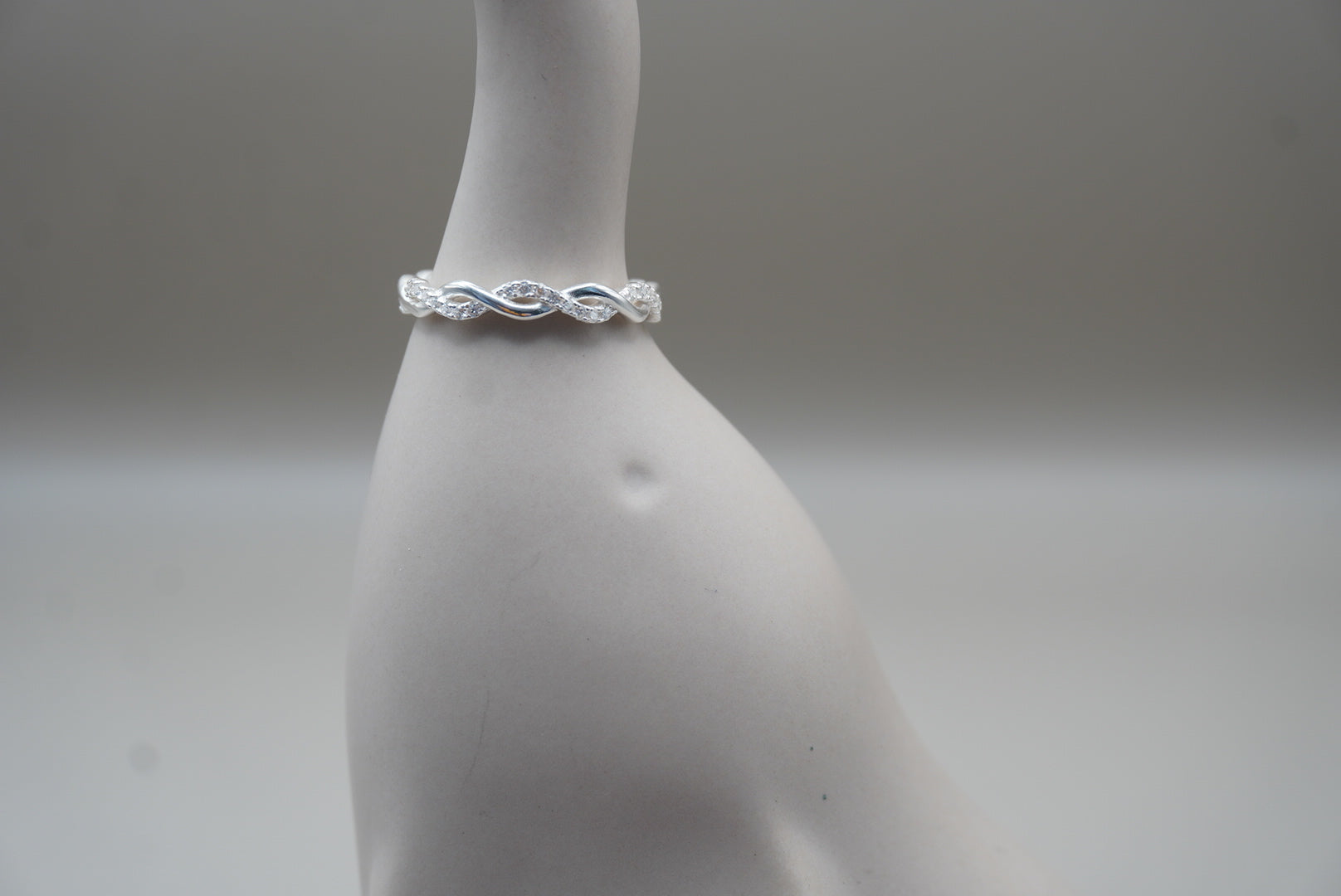 ARGOLLA TRENZADA LISA Y ZIRCONIA #9 PLATA .925