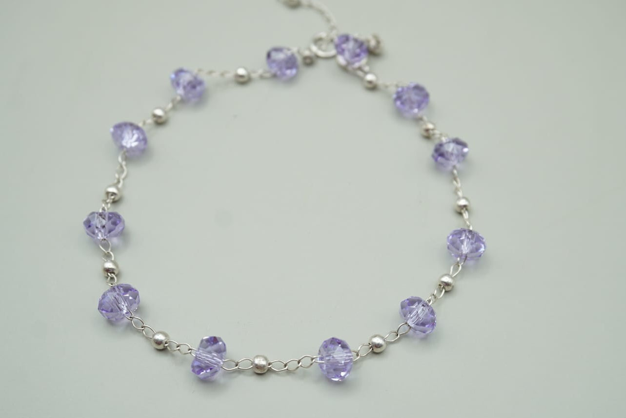 PULSERA CON ZIRCONIAS LILA PLATA .925