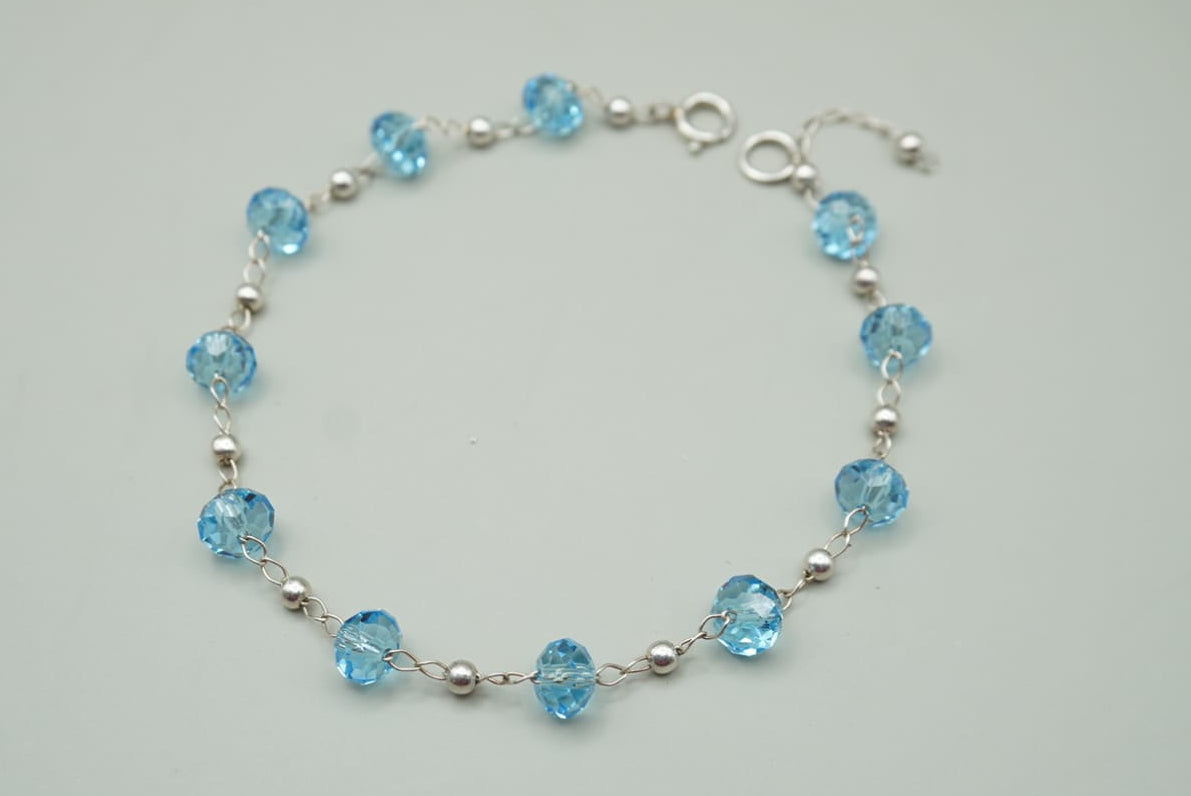 PULSERA ZIRCONIAS AZULES PLATA .925